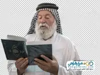 تصویر دوربری مرد عرب در حال قرآن خواندن
