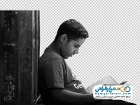 تصویر با کیفیت پسر در حال قرآن خواندن