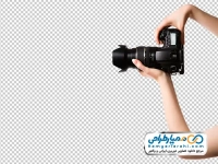 تصویر با کیفیت دوربین عکاسی حرفه ای در دست